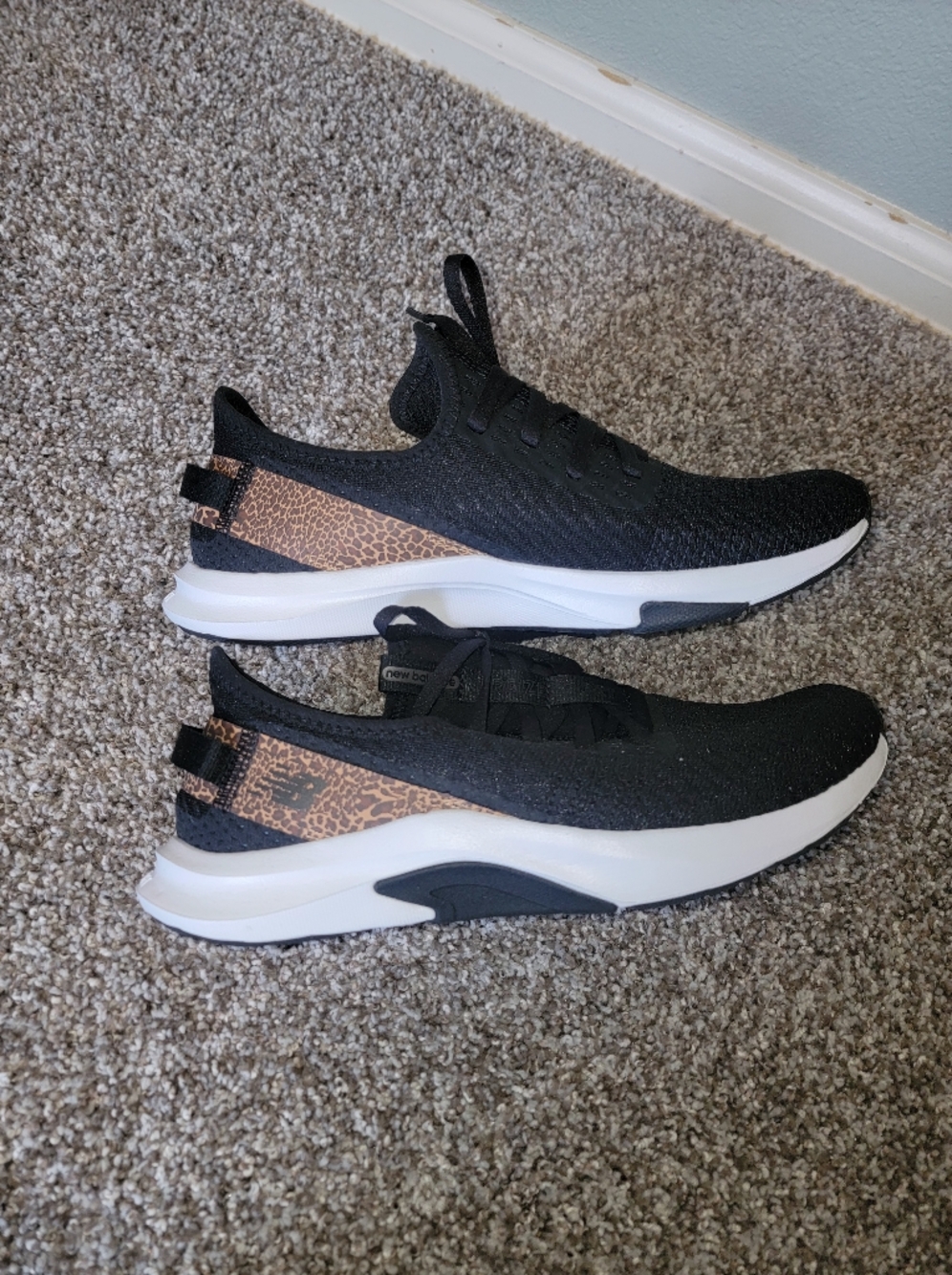 New Balance Black Knit Sneakers with Leopard Print Heel Accent